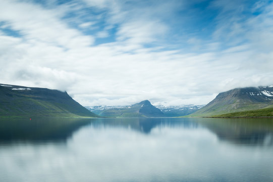 Fjord Mountains reflect in the lake