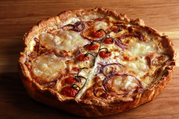 Best Chicken Quiche with ham, mozzarella, onion and cherry tomato. Bio vegetables, rustic food, homemade food 