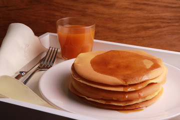 Pancakes with honey and juice, wonderful breakfast homemade food
