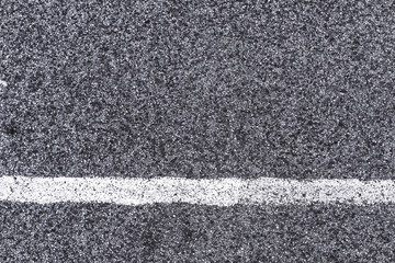 White line and asphalt road as simple urban background pattern