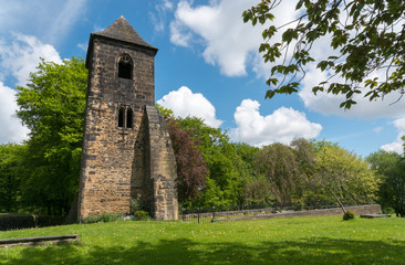 Fototapeta na wymiar The Old Tower of St Mary's Church Mirfield, West Yorkshire, England built in the 13th Century.