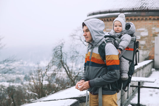 Family Walking In Ljubljana, Slovenia At Winter Time.