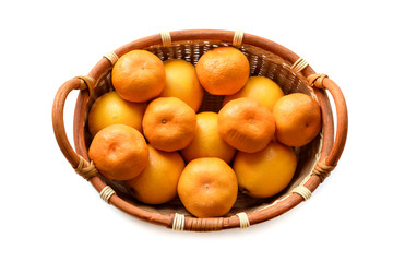 Organic mandarin in basket on a white background