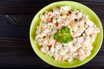 Olivier salad with boiled vegetables. Traditional Russian cuisine.