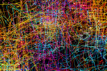 Multicolored bright glowing abstract lines and curves