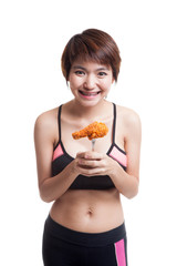 Beautiful Asian healthy girl enjoy eating   fired chicken