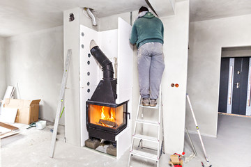 Fireplace installing. Fireplace made from Calcium Silicate Fire Protective Board