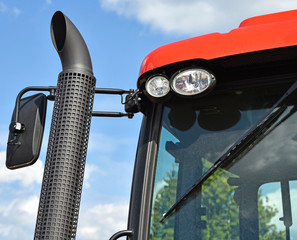 Naklejka premium Exhausting pipe of a tractor