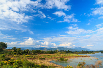 Blue sky with clouds mountain forest  nature landscape