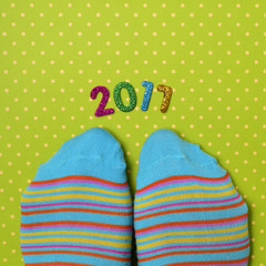 feet wearing socks and number 2017, as the new year