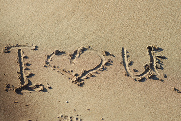 I love you on a sand of beach.