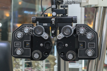 Optician gear used to test eye for glasses prescription.
 - obrazy, fototapety, plakaty