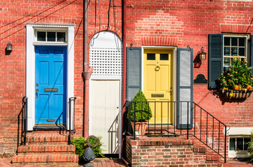 Colourful Wooden Doors on an Brick Building
