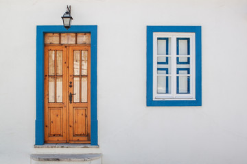 Old wood door with windows. Portugal Algarve.