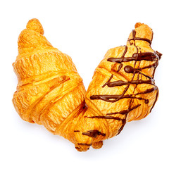 two fresh croissants on white background
