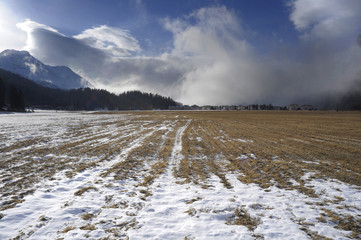 Engadin valley in Switzerland Sils Maria village with snow on Alp mountains