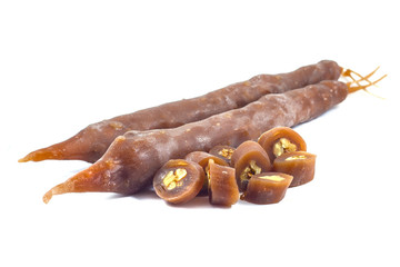 Tasty oriental sweets (churchkhela), isolated on white, Georgia