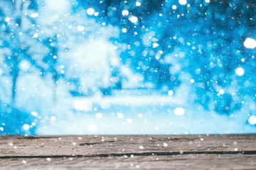 Wooden boards on the winter blur background
