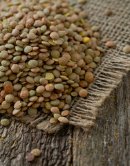 lentils on wooden surface
