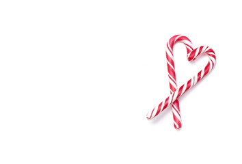 Background with heart of Christmas candy can