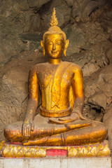 Buddha in the cave , deep to the cave in Thailand