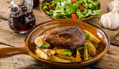 Beef steak with herbs and wine