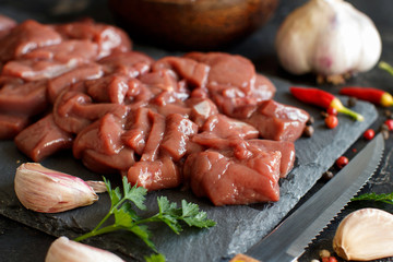 Raw beef liver with spices, herbs  and vegetables