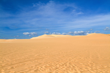 Fototapeta na wymiar Sand dune with footprints