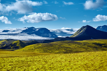 Travel to Iceland. Beautiful Icelandic landscape with mountains, sky and clouds. Trekking in...