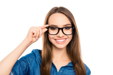 Obraz premium Portrait of pretty young happy secretary touching glasses