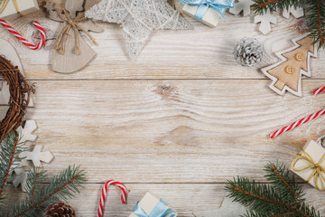 Christmas decorations on wooden table. View from above.