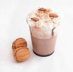 Glass of hot chocolate with whipped cream isolated on white