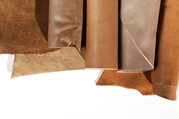 rolls of  brown leather isolated on white background 5