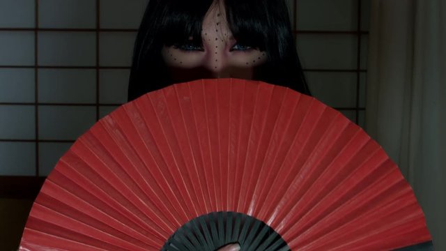 4k Anime Shot of a Japanese Woman Geisha Posing with a Red fan, Eyes only