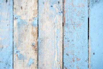 texture of wooden planks painted in blue