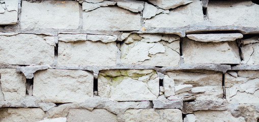 damaged ruined masonry white brick wall, texture