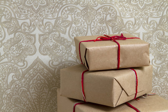 stack of gift boxes on wallpaper background