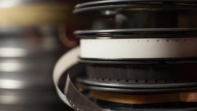 Close up of a stack of vintage film movie reels
