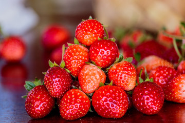 Fresh strawberries on old table wood