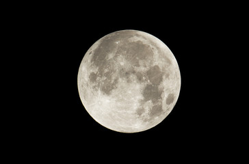 Full moon on the dark sky