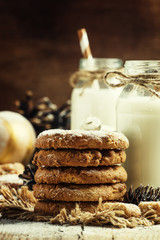 New year cookies and cream in the festive decorations, vintage w