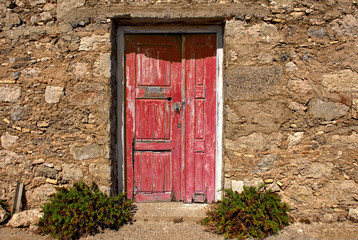 Colorful wall and doors in Greece