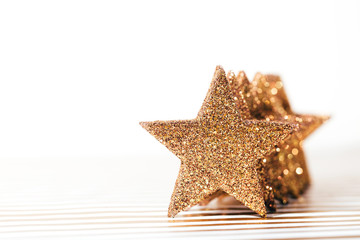 Fototapeta na wymiar Group of textured glittering golden stars