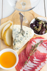 wine glass with wine and snacks
