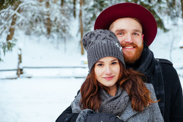 beautiful couple in love. Portrait of winter background