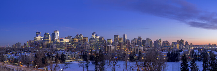 Fototapeta premium Sweeping skyline view at sunset in Calgary, Alberta. Calgary is home to many oil companies. 