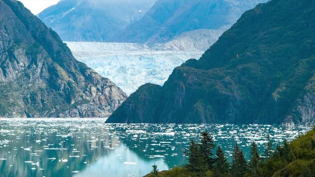 Moving Telephoto View of Sawyer Glacier in Tracy Arm Fjord Alaska as the Cruise Ship comes Around the Bend
