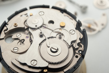 Detail of watch machinery on the table.