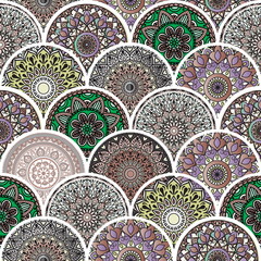 Colorful floral seamless pattern from circles with mandala in patchwork boho chic style, in portuguese and moroccan motif