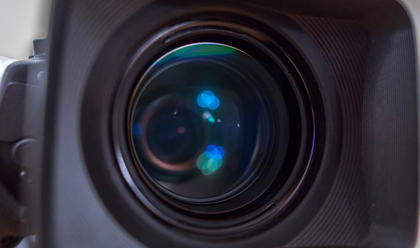 the lens of the television camera close-up
